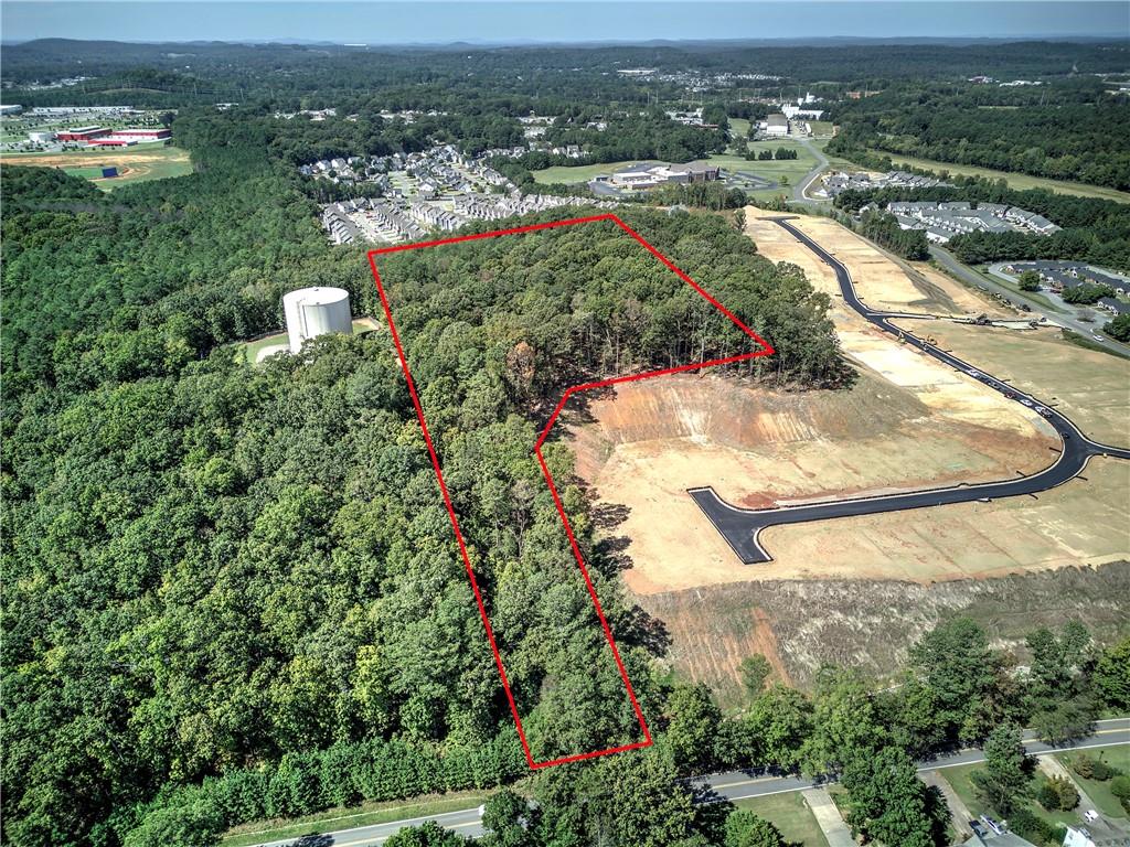 0 Cline Smith Cartersville, GA 30121 - Photo 2 of 7 an aerial view of a house with a yard and lake view