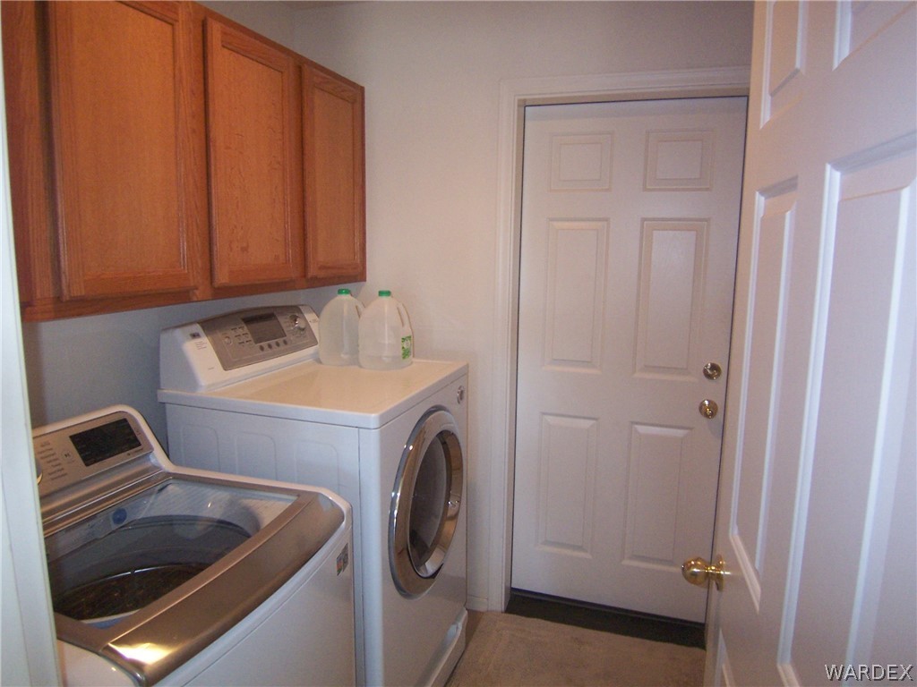 2340 Corwin Road Bullhead City, AZ 86442 - Photo 24 of 38 a utility room with dryer and washer
