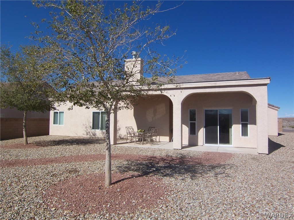 2340 Corwin Road Bullhead City, AZ 86442 - Photo 32 of 38 a view of a house with a tree