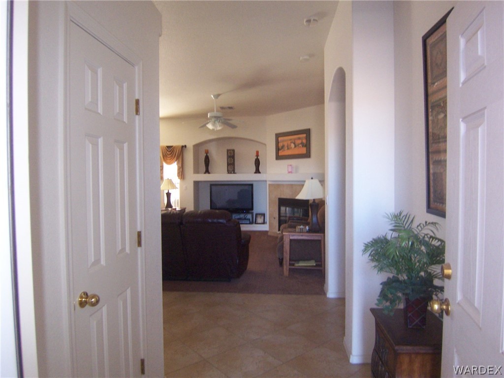 2340 Corwin Road Bullhead City, AZ 86442 - Photo 4 of 38 a living room with furniture and a fireplace