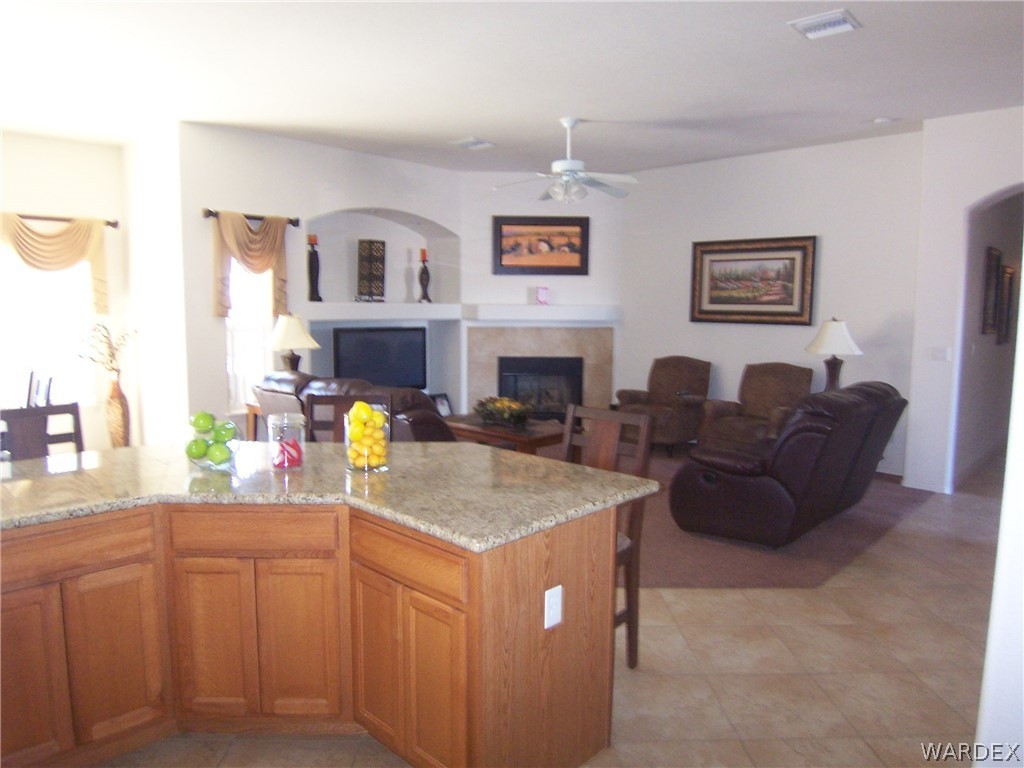 2340 Corwin Road Bullhead City, AZ 86442 - Photo 8 of 38 a living room with furniture and a kitchen area