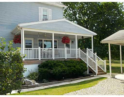 634 Jacobs Run Road Graysville, PA 15337 - Photo 9 of 18 Other. Side Porch with Low Maintenance Deck