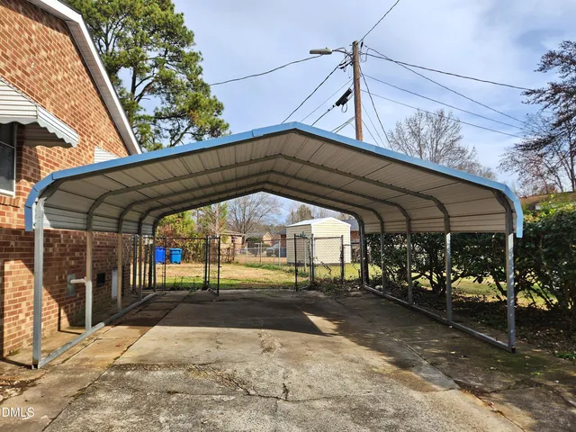 a view of a building with a tree