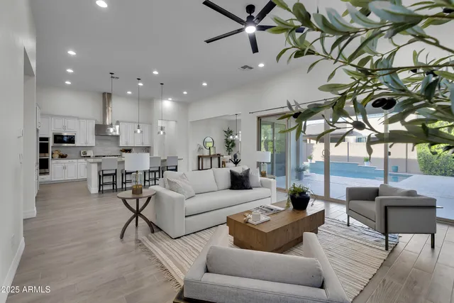 a bedroom with a bed and a television