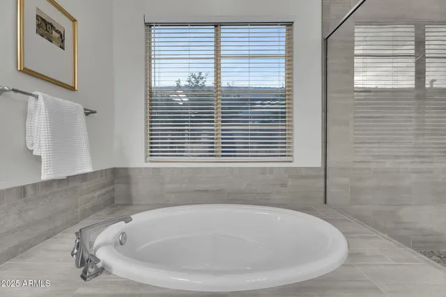 a view of a street with a building in the background