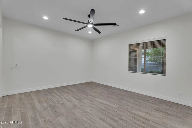 a view of a golf course with a lake view