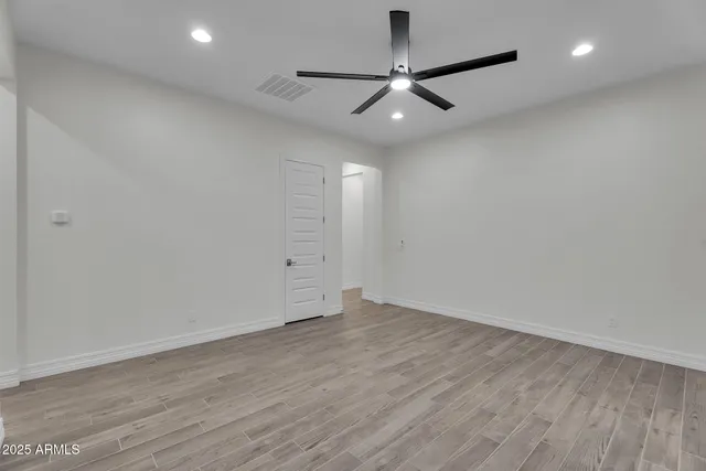 a view of a golf course with a big yard