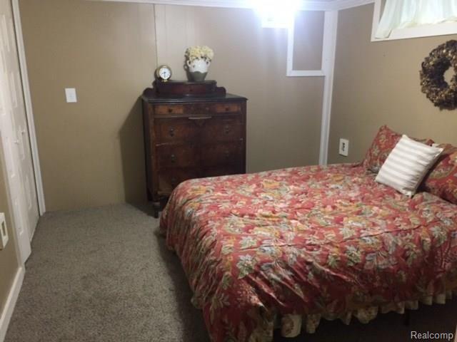 3874 Peters Road Columbiaville, MI 48421 - Photo 11 of 28 11 - Guest Bedroom Downstairs.JPG