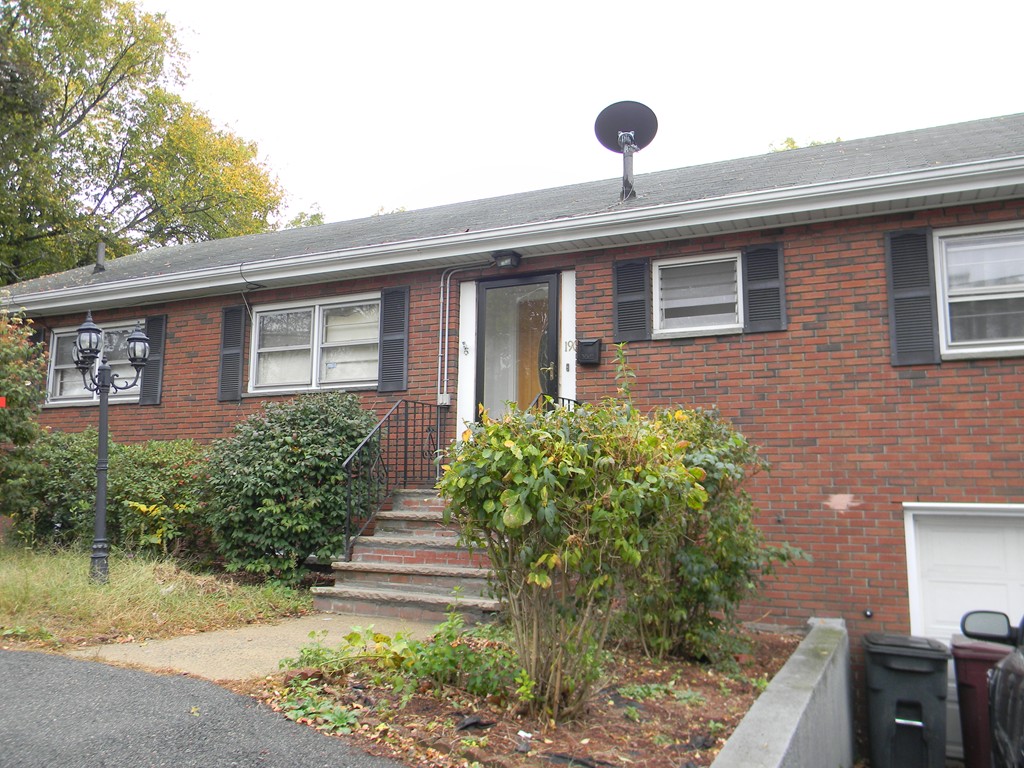 190 Ridge Road Revere, MA 02151 - Photo 2 of 13 a front view of a house with garden