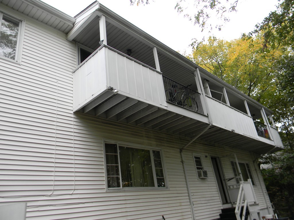 190 Ridge Road Revere, MA 02151 - Photo 4 of 13 a view of a house with a door