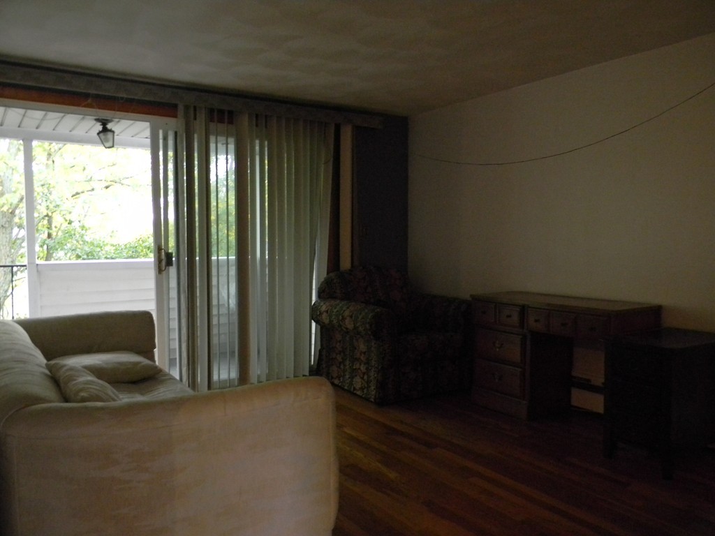 190 Ridge Road Revere, MA 02151 - Photo 7 of 13 a living room with furniture and a window
