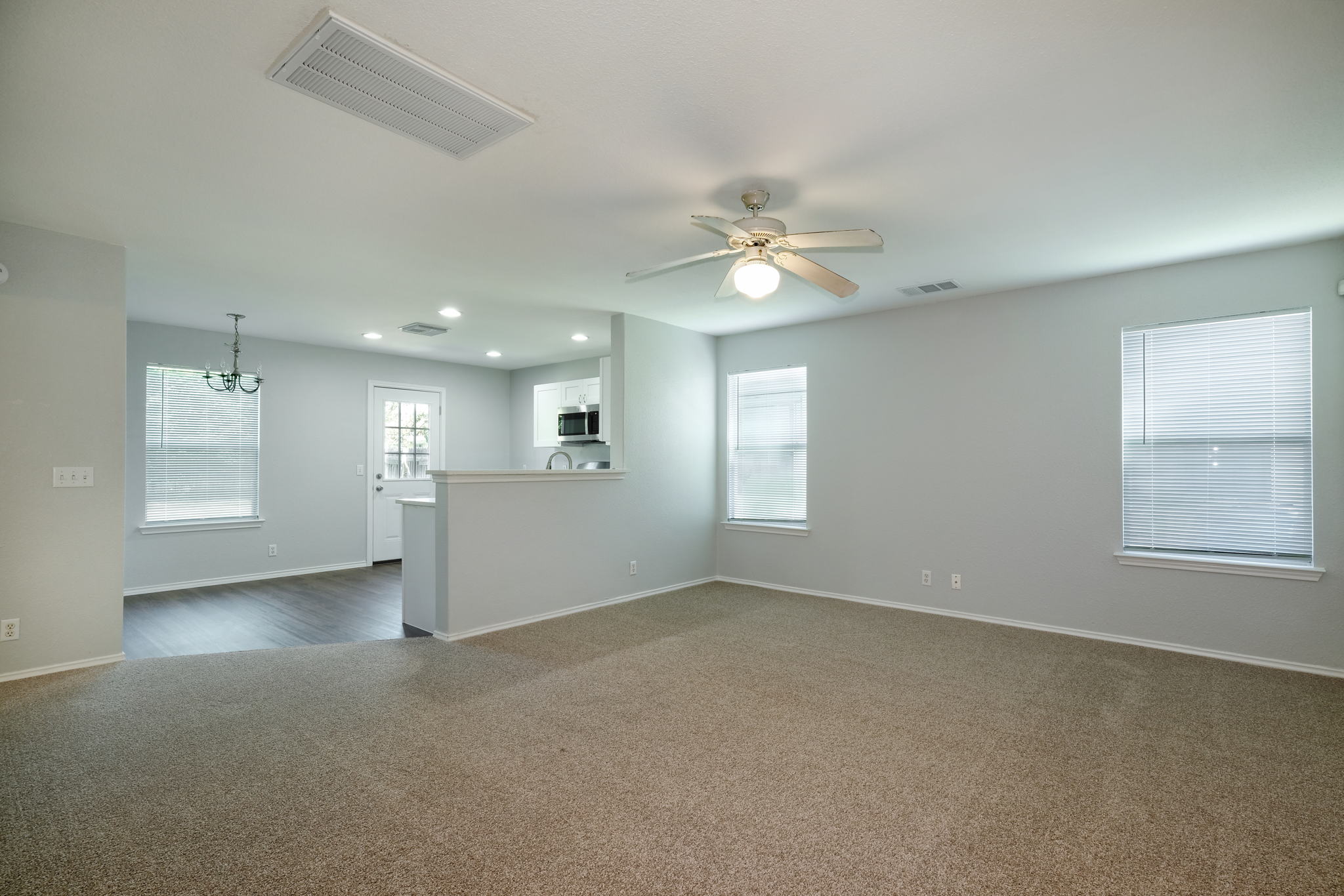 14312 Cummins Way Manor, TX 78653 - Photo 2 of 13 a view of an empty room with a window