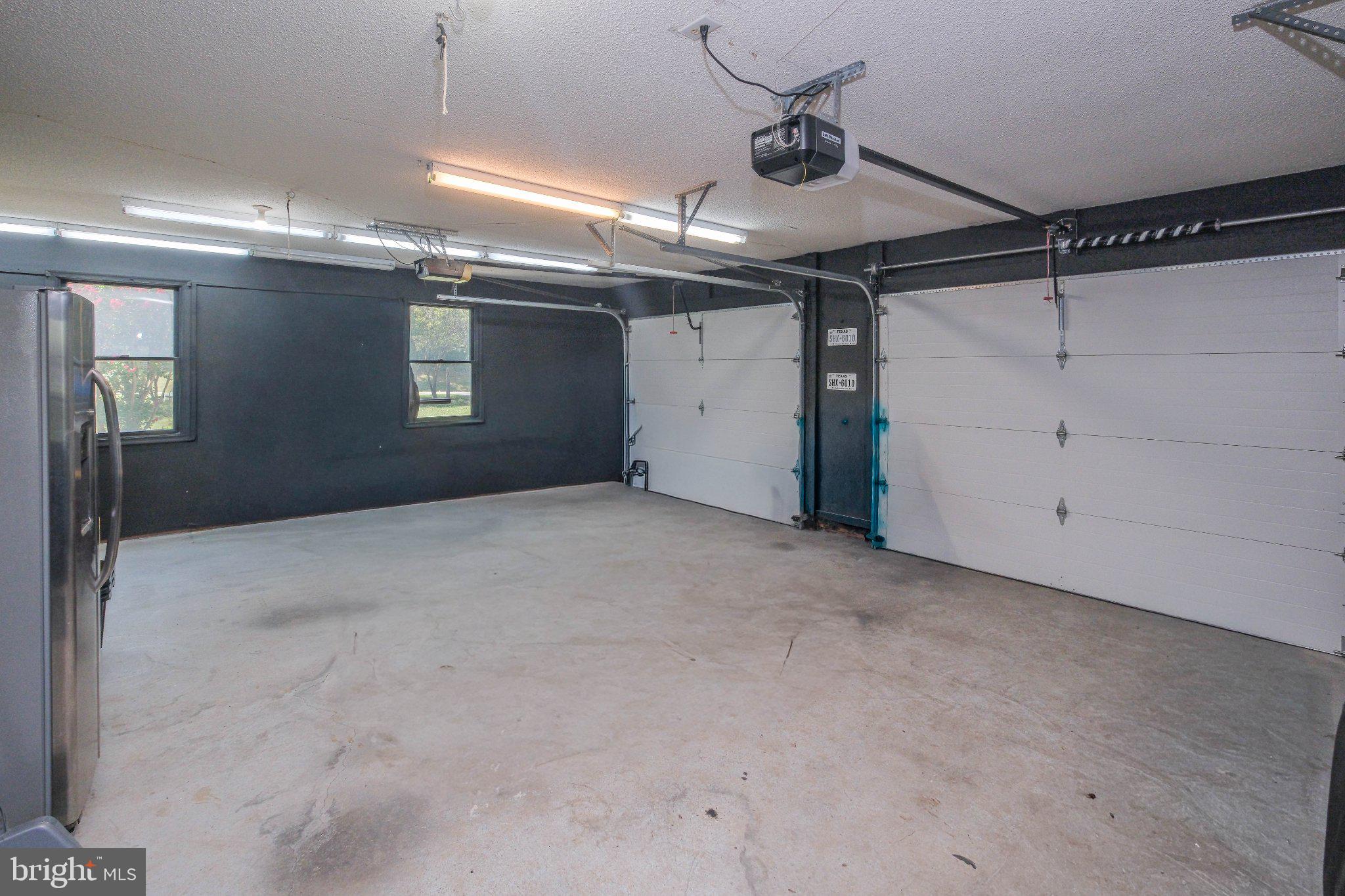 1163 Tasker Road Stephens City, VA 22655 - Photo 37 of 46 Spacious garage with modern features.