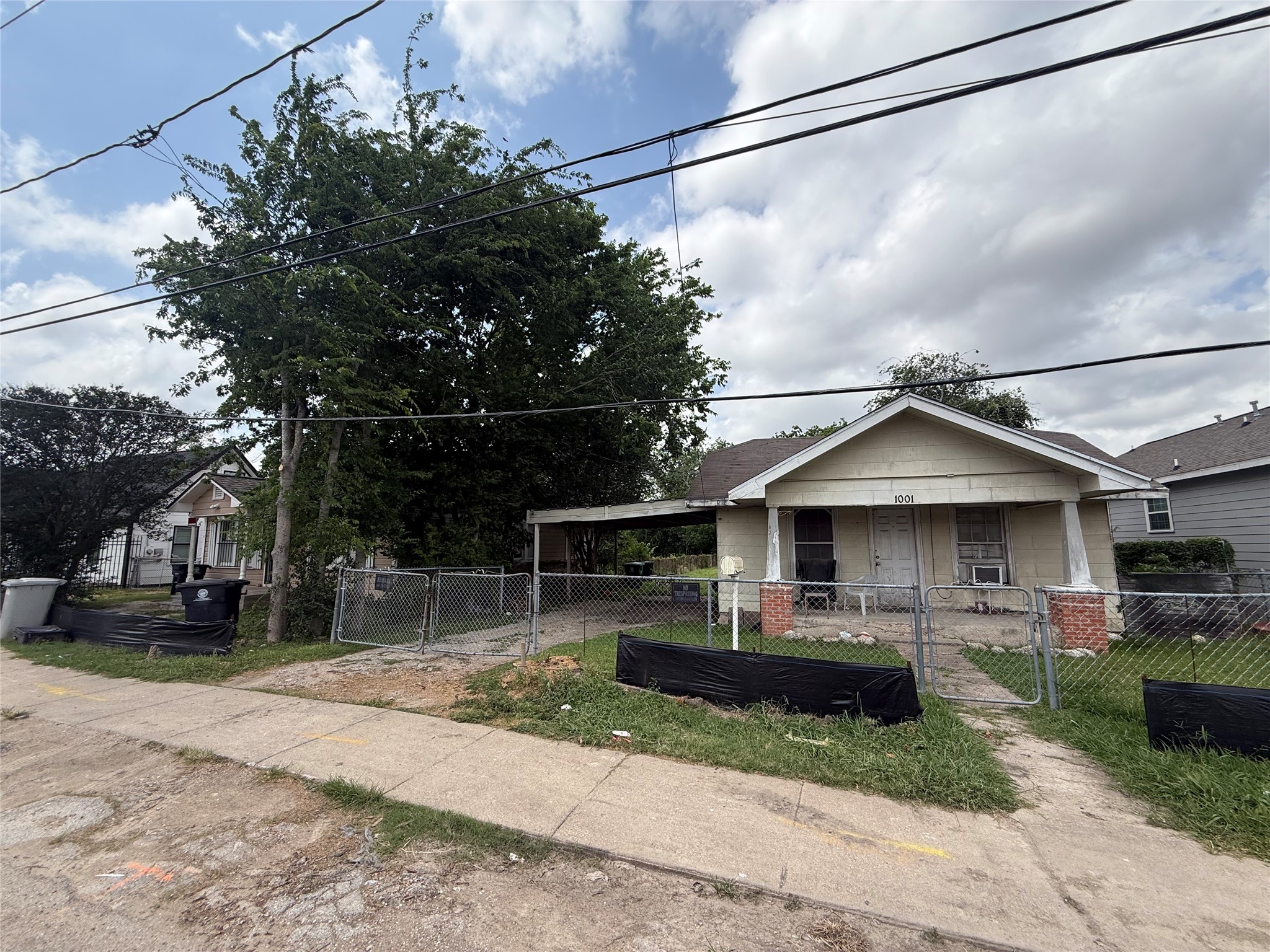 1001 Booth Street Houston, TX 77009 - Photo 3 of 12 a view of a car park in front of house