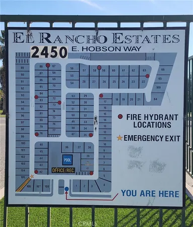 a sign on the wall of building