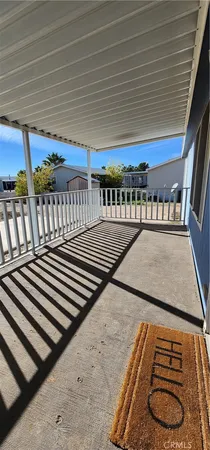 a view of balcony with wooden floor