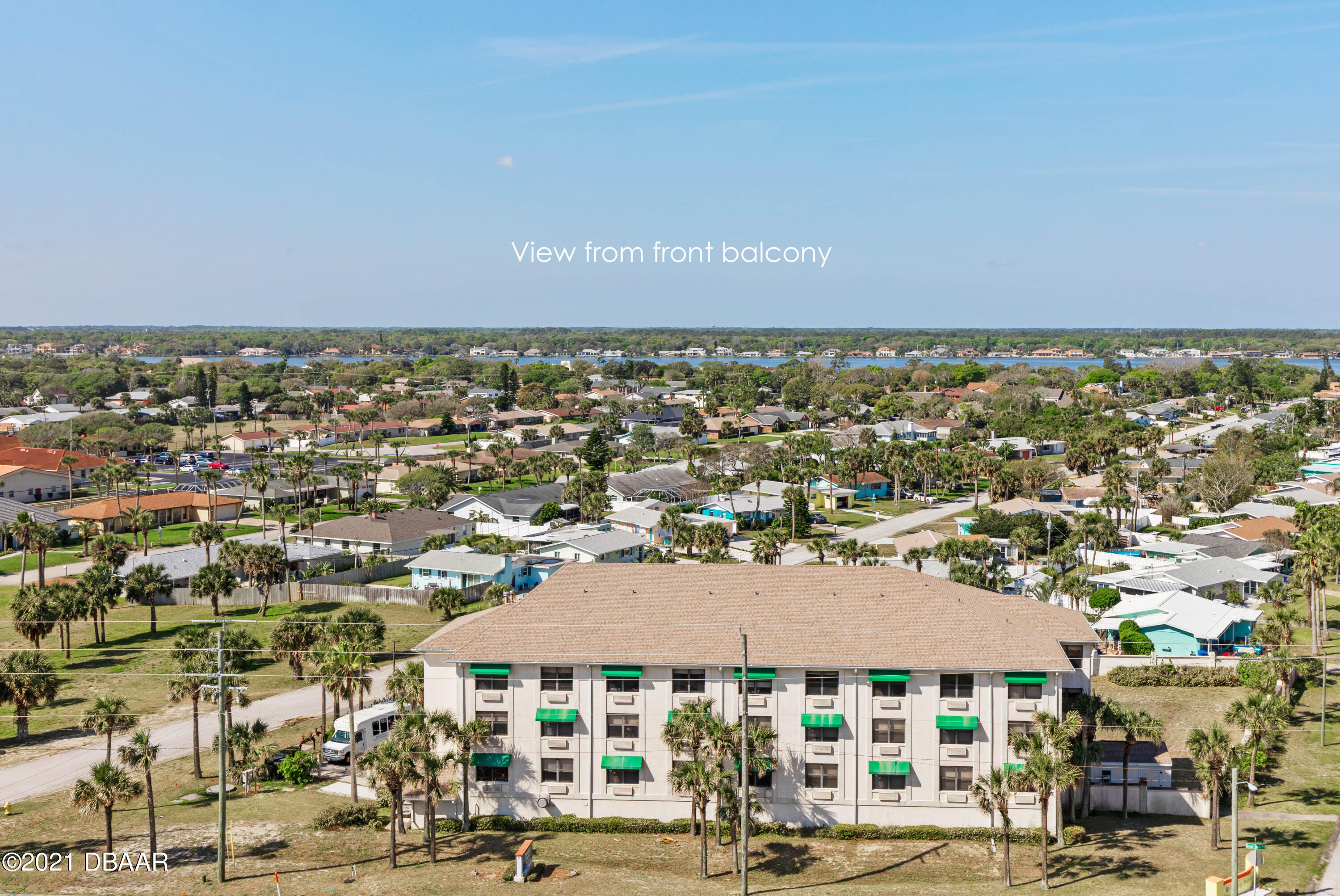 1051 Ocean Shore Boulevard, Unit 1102 Ormond Beach, FL 32176 - Photo 22 of 29 an aerial view of residential building and street