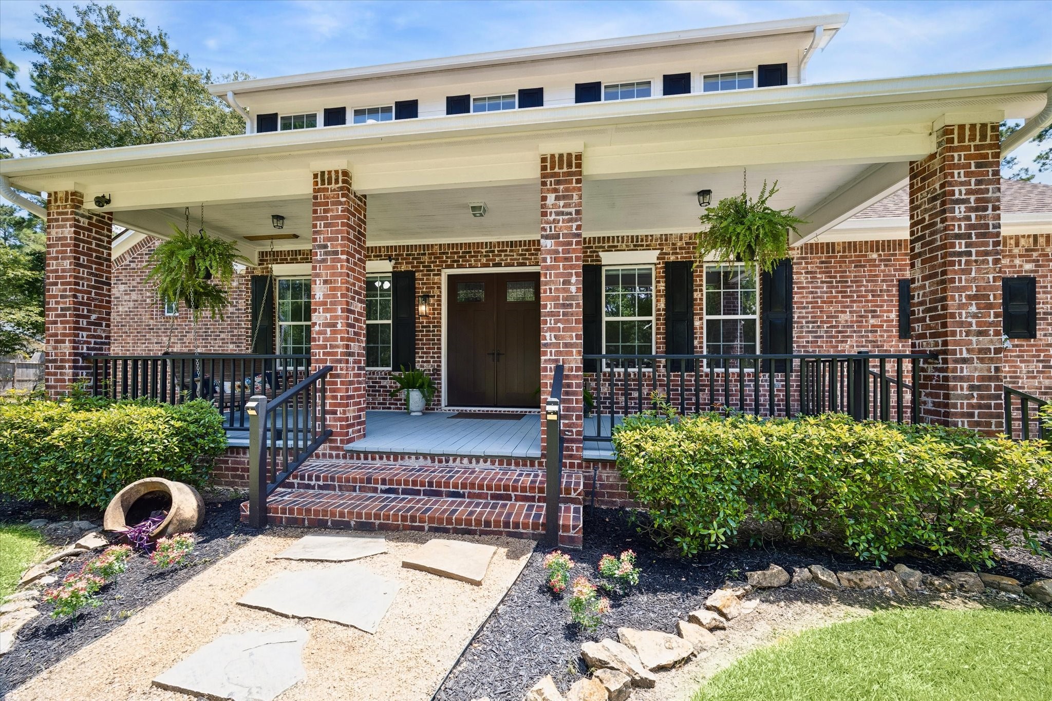 Enjoy your morning coffee on the front porch looking out to the peaceful green yard.