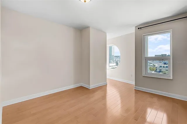 a bedroom with a bed and couch