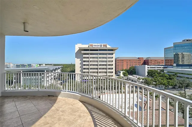 a view of a balcony with city view