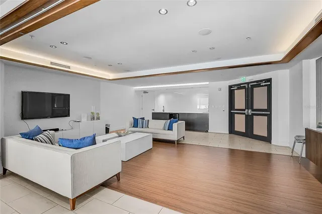 a view of a patio with swimming pool table and chairs