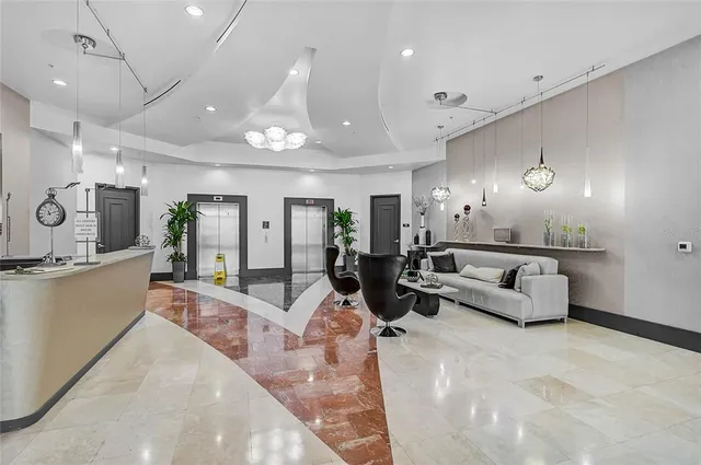 a view of a patio with a table and chairs