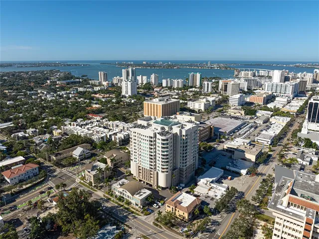 a view of a building with a yard