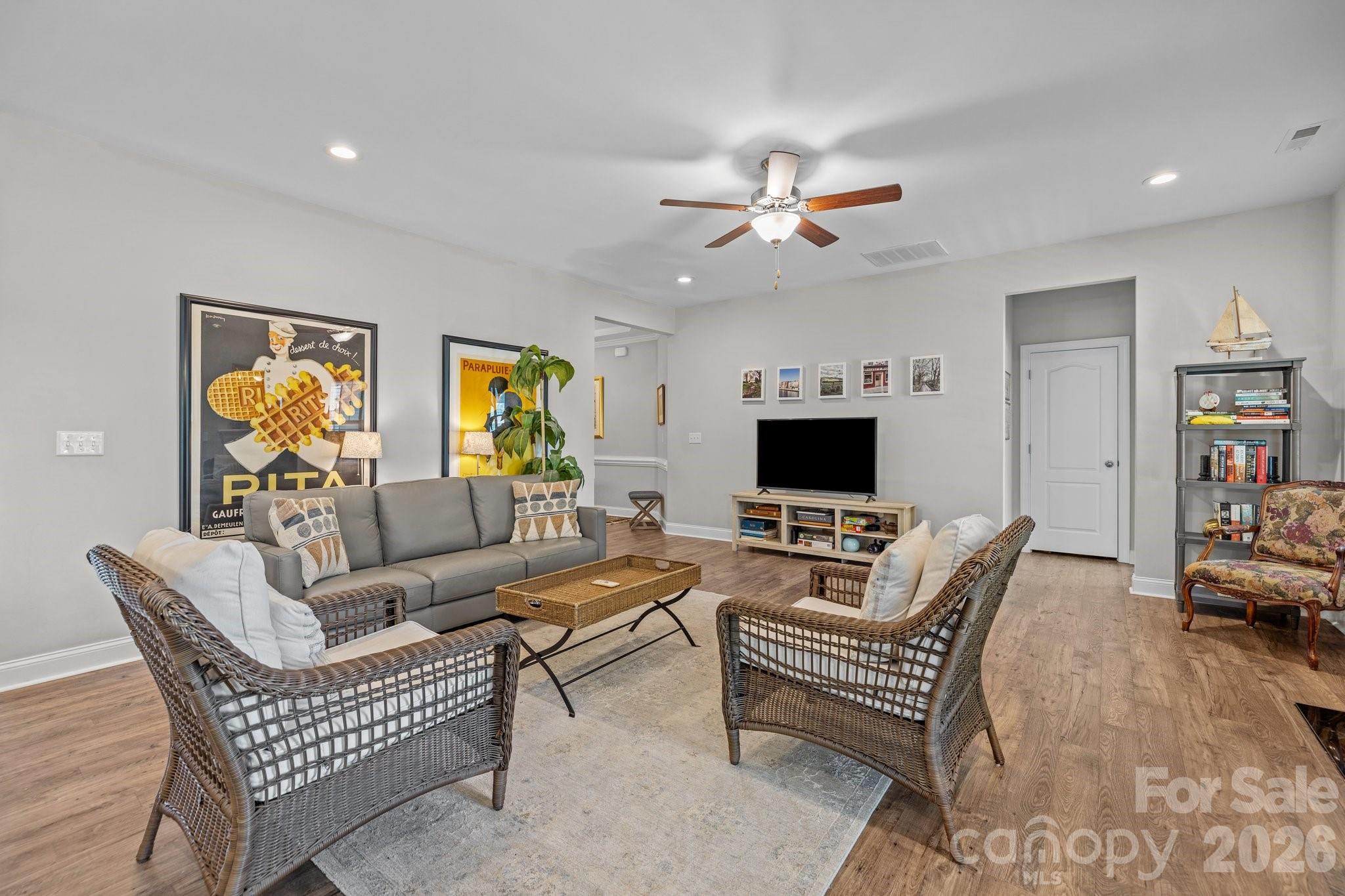 4697 Rinaldo Road York, SC 29745 - Photo 7 of 37 a living room with furniture fireplace and a flat screen tv