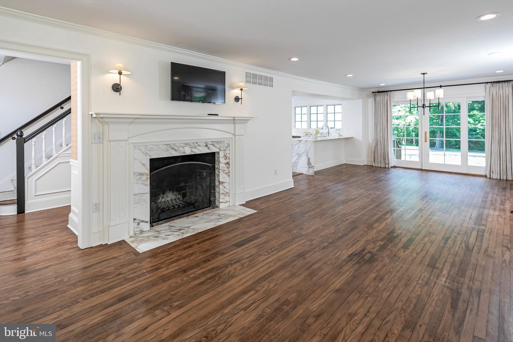 131 Randall Road Princeton, NJ 08540 - Photo 6 of 33 Living Room with Fireplace and Dining Room