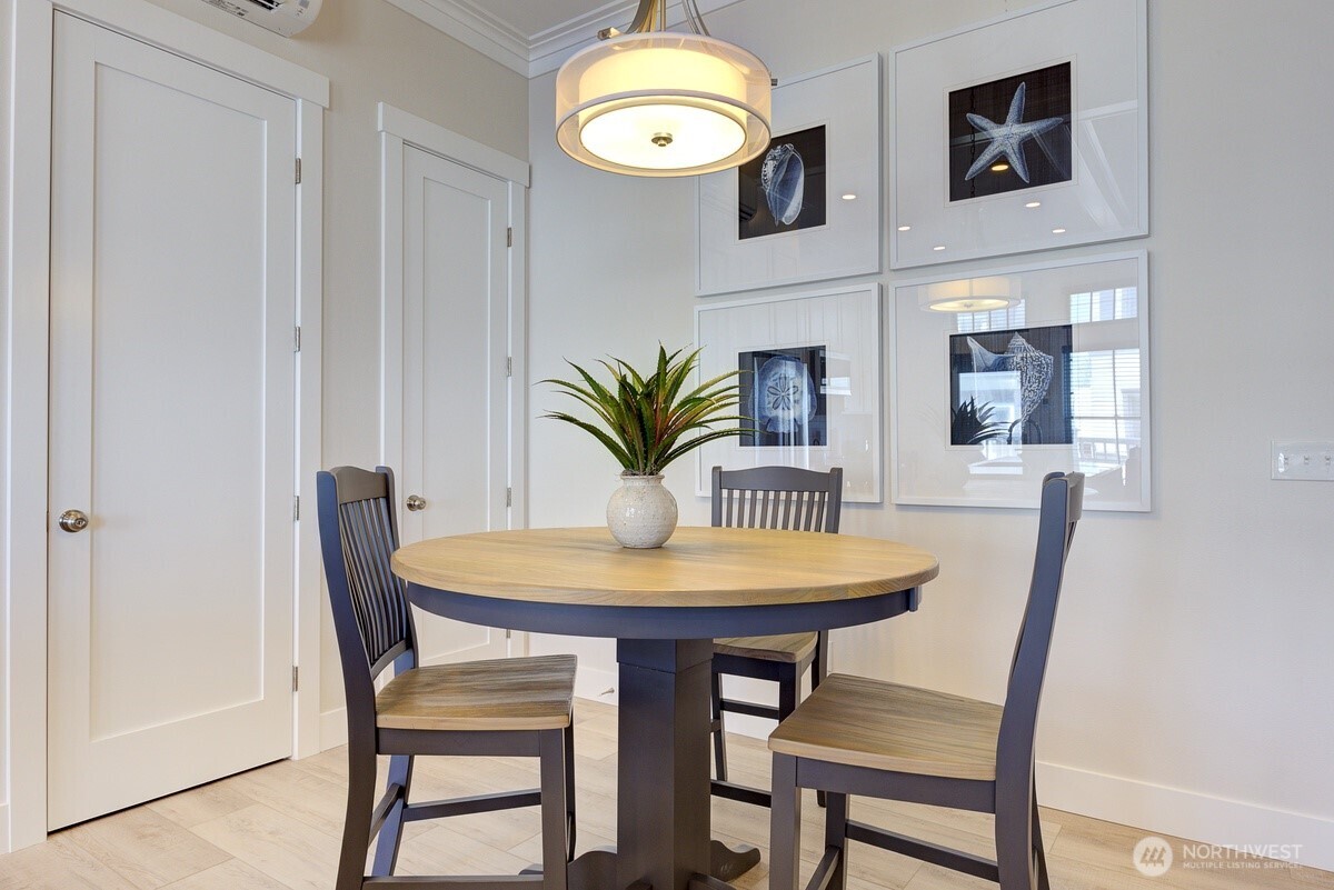 204 Market Street, Unit B Pacific Beach, WA 98571 - Photo 15 of 25 a view of a dining room with furniture