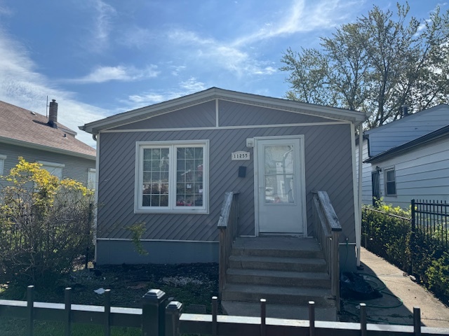 11255 South Church Street Chicago, IL 60643 - Photo 1 of 1 a front view of a house with garden
