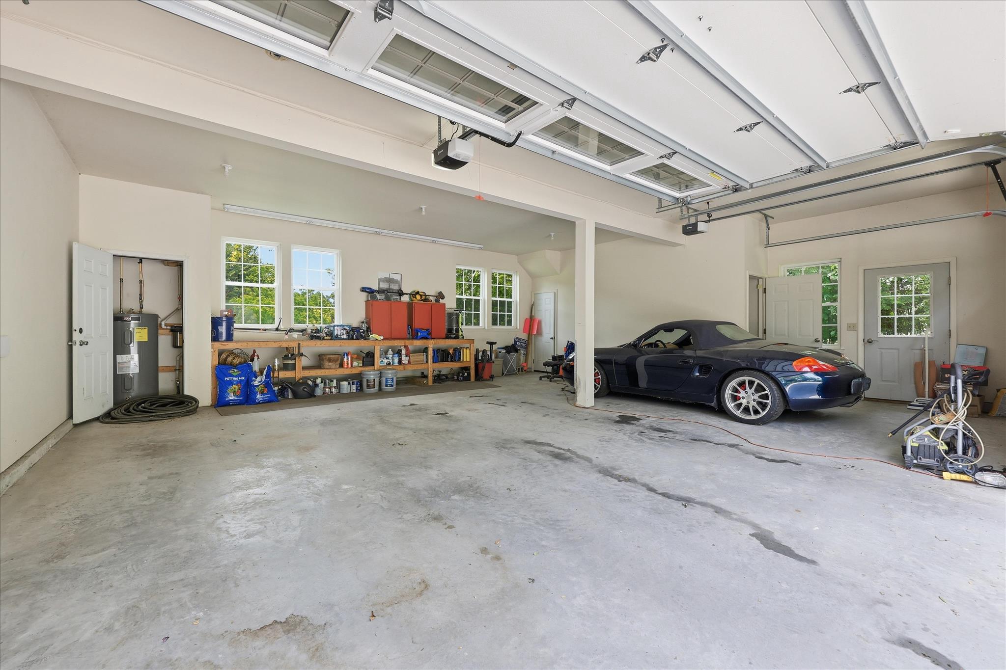 10919 Etzler Mill Road Woodsboro, MD 21798 - Photo 42 of 54 Garage w/ extra depth, lighting & a workbench!