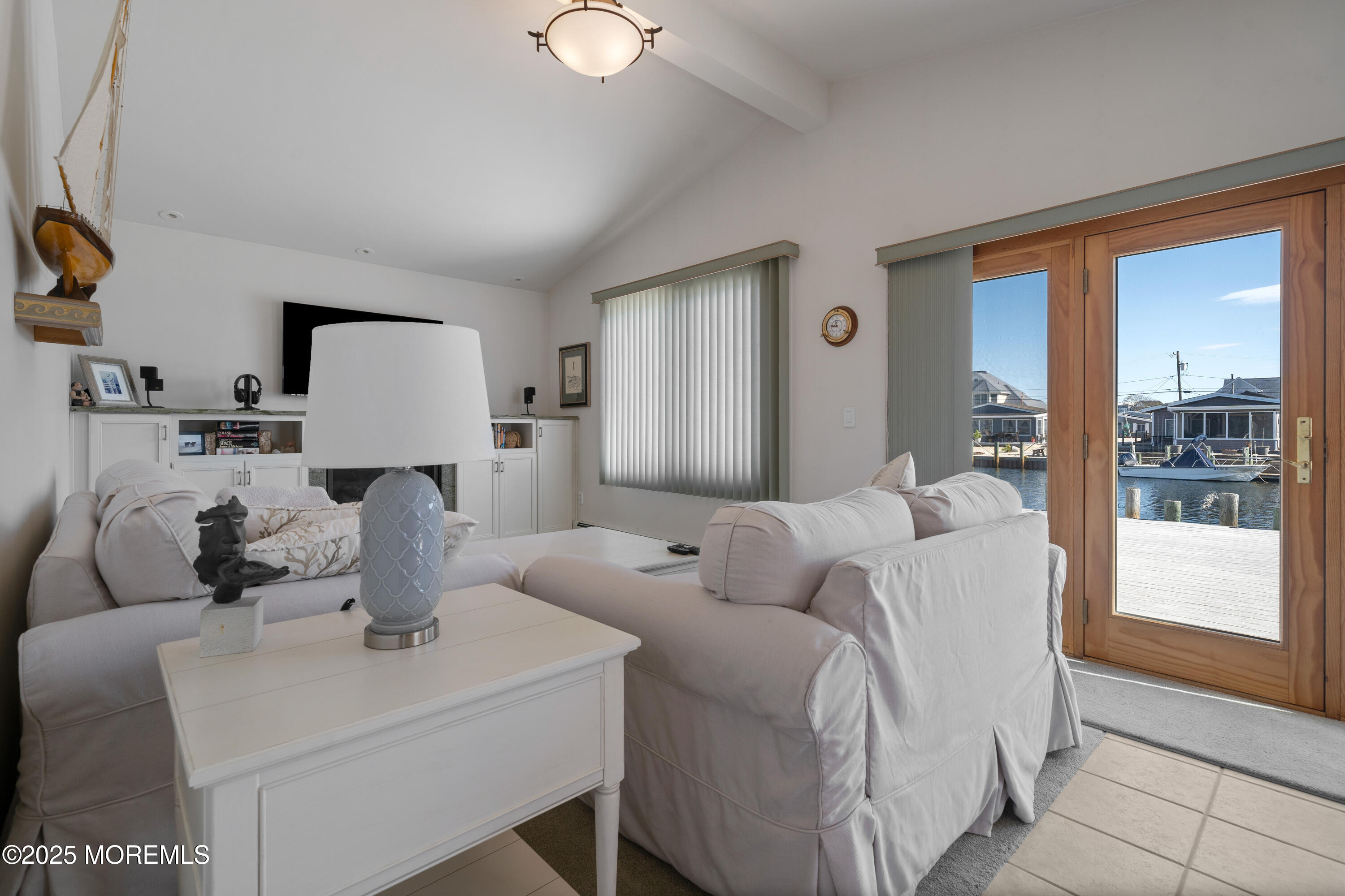 1211 Gemini Court Forked River, NJ 08731 - Photo 14 of 40 a living room with furniture and a large window