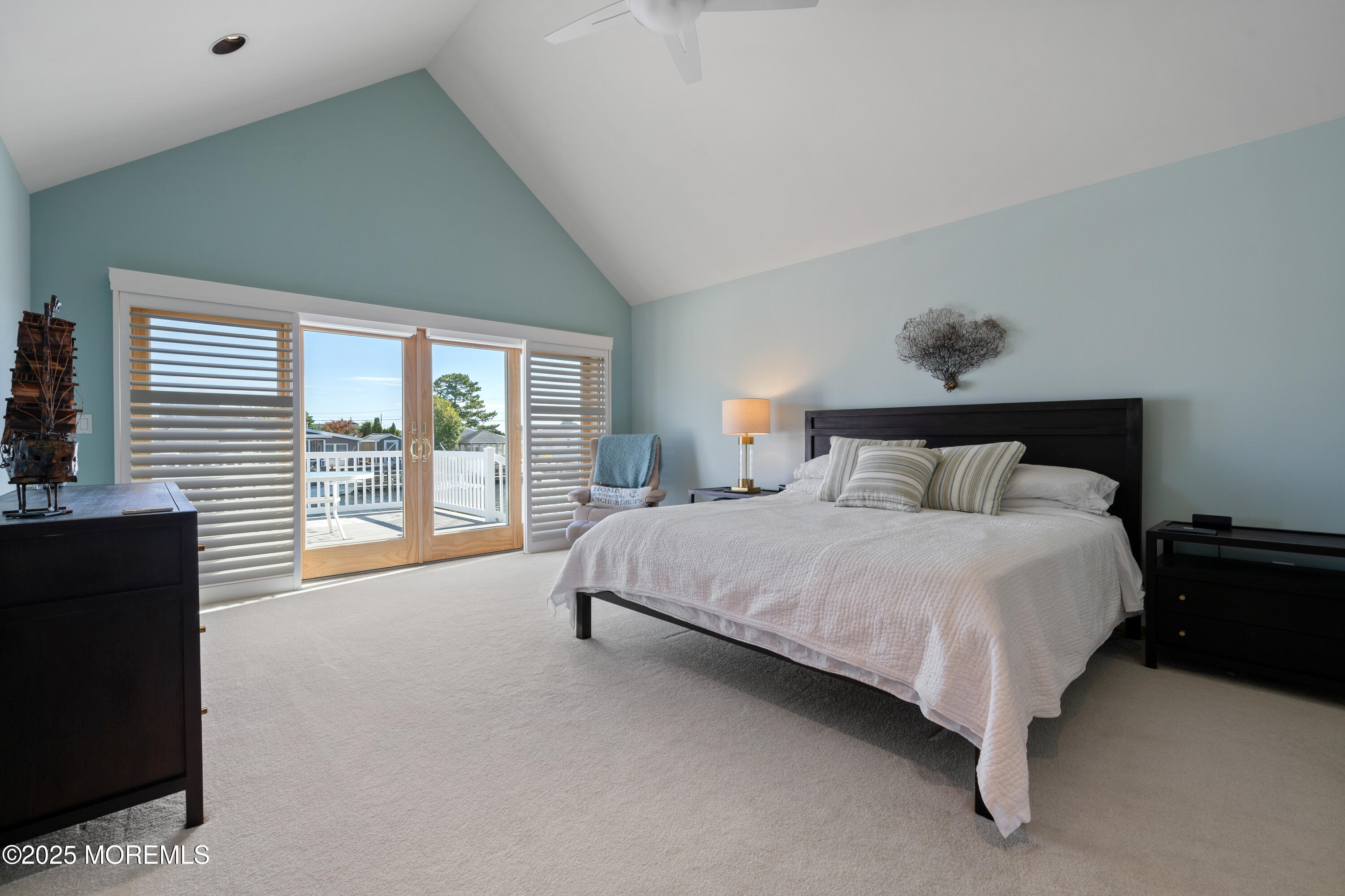 1211 Gemini Court Forked River, NJ 08731 - Photo 7 of 40 a spacious bedroom with a bed and a large window