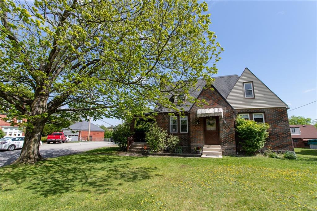 3211 Willett Road Pittsburgh, PA 15227 - Photo 25 of 27 a front view of a house with garden