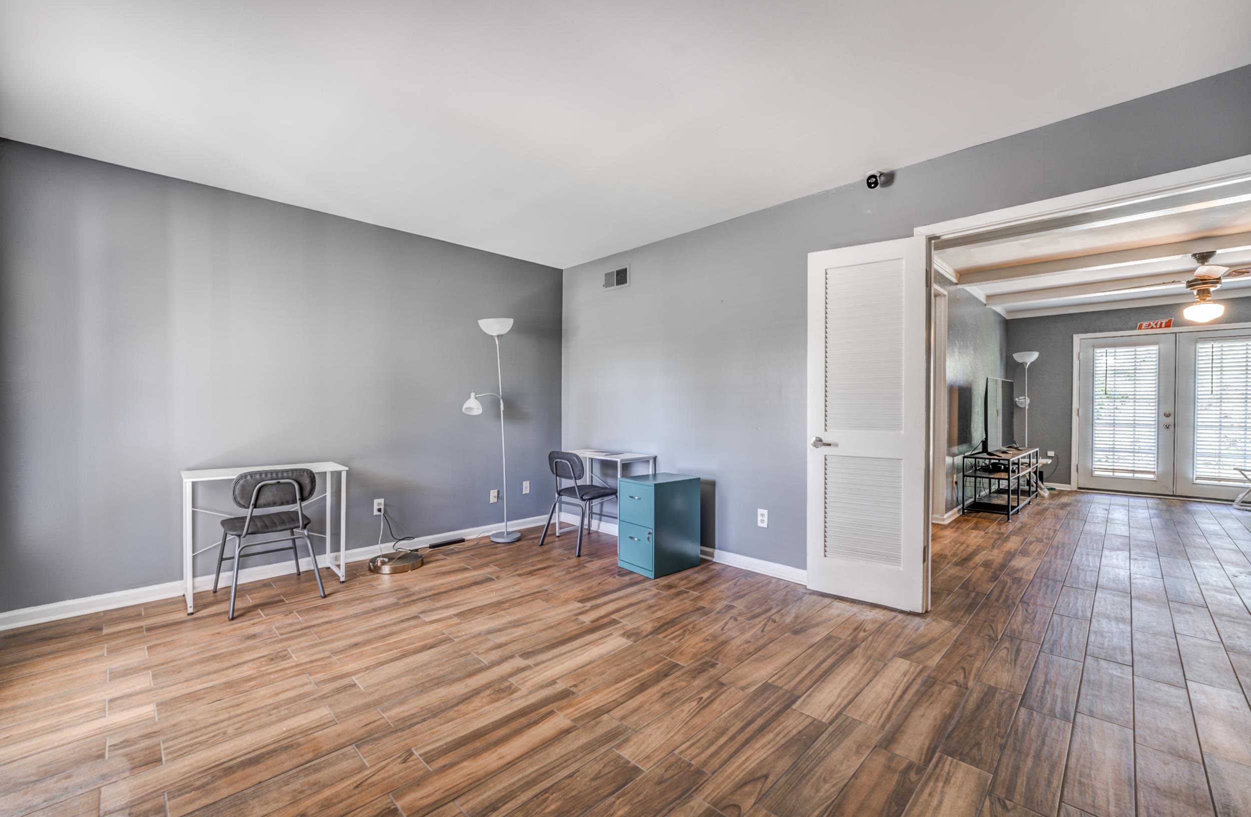2865 Knightway Road Memphis, TN 38118 - Photo 3 of 19 a bedroom with a bed and wooden floor