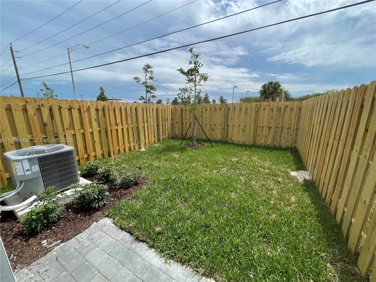 13262 Southwest 287th Terrace Homestead, FL 33033 - Photo 9 of 33 a view of a backyard