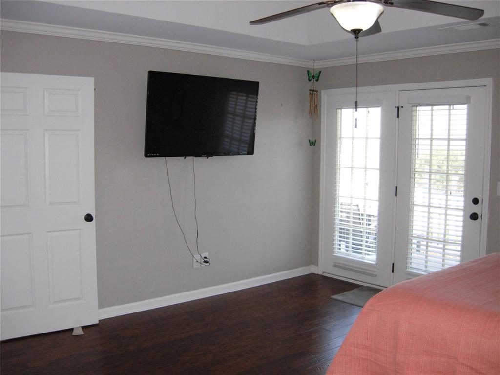 108 Millers Lane Calhoun, GA 30701 - Photo 11 of 21 a view of a livingroom with a ceiling fan and window
