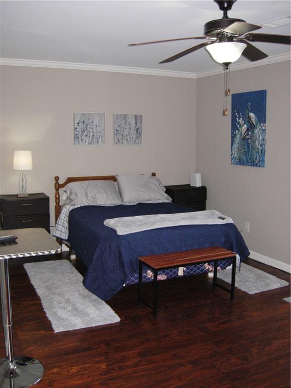 108 Millers Lane Calhoun, GA 30701 - Photo 14 of 21 a bed room with a bed and a chair