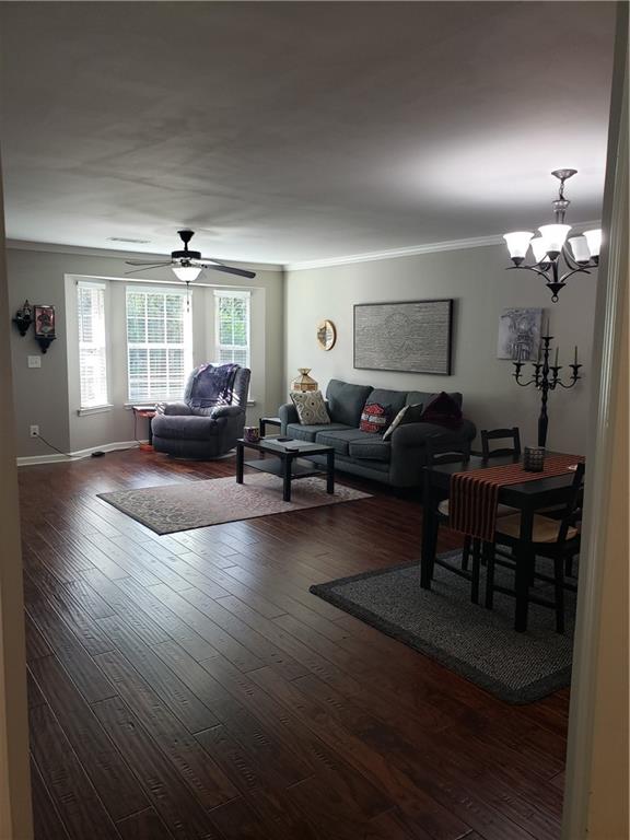 108 Millers Lane Calhoun, GA 30701 - Photo 2 of 21 a living room with furniture and a chandelier