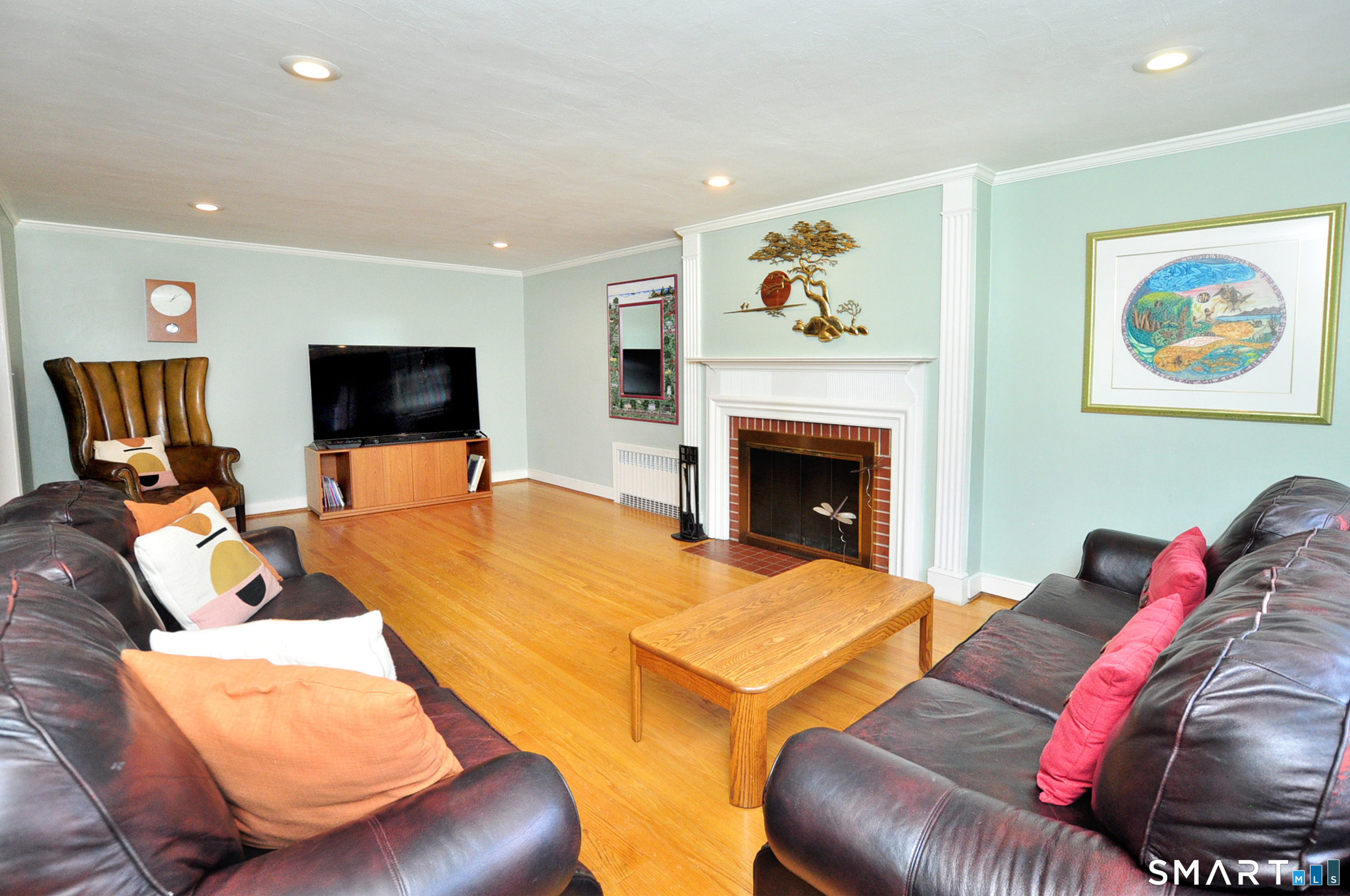 44 Miamis Road West Hartford, CT 06117 - Photo 7 of 39 a living room with furniture and a fireplace