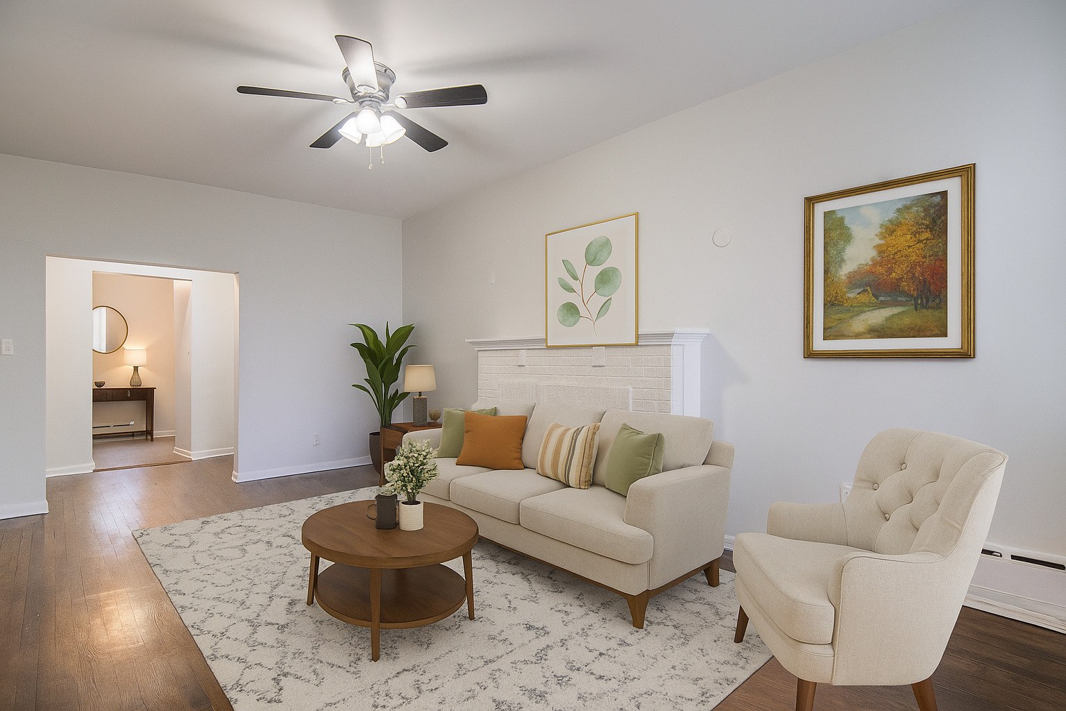 310 South Springfield Avenue, Unit 2S Chicago, IL 60624 - Photo 2 of 15 a living room with furniture and a potted plant