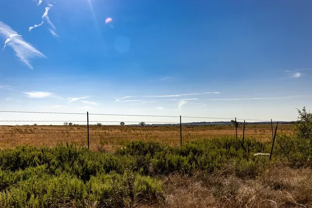 a view of a lake and outdoor space