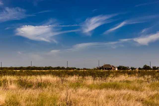 a view of a lake with houses