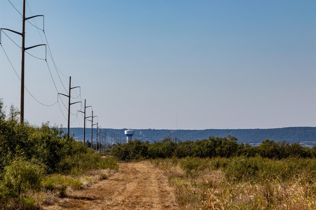 242 County Road 242 Clyde, TX 79510 - Photo 26 of 40 a view of a lake and mountain in the back
