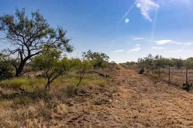 a aerial view of a house with a yard