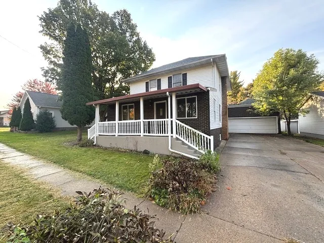 a house view with a garden space