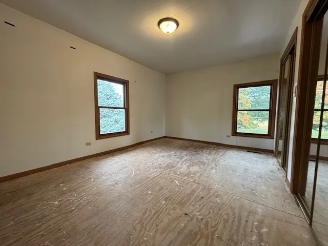 an empty room with windows