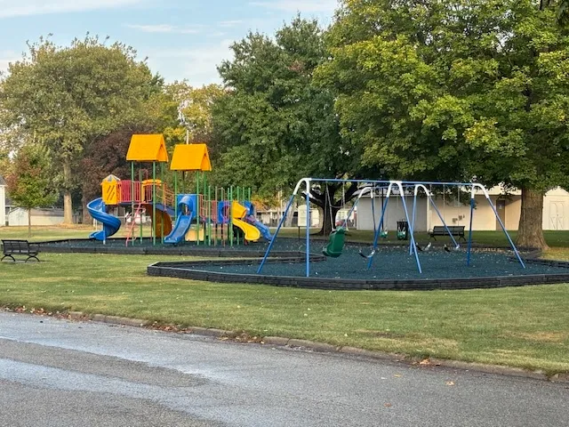 a view of a golf course with a lake