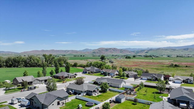772 East 600 South Preston, ID 83263 - Photo 34 of 35 Residential neighborhood with single-story homes featuring fenced yards and mature trees